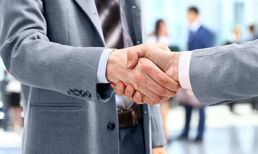 22400358 - handshake in front of business people